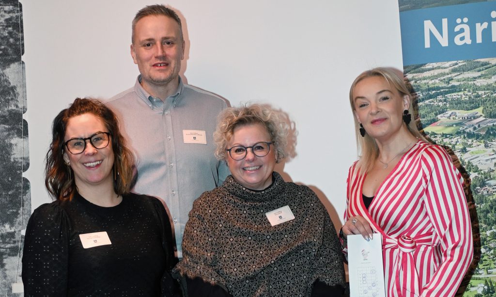 Fyra personer som är samlade på årets sita Näringslivsfrukost.